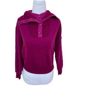 Cranberry color size medium sweater with unique details